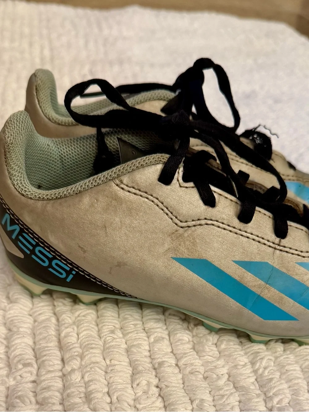 adidas Kids Messi Soccer Cleats in Light Gray with Blue Stripes